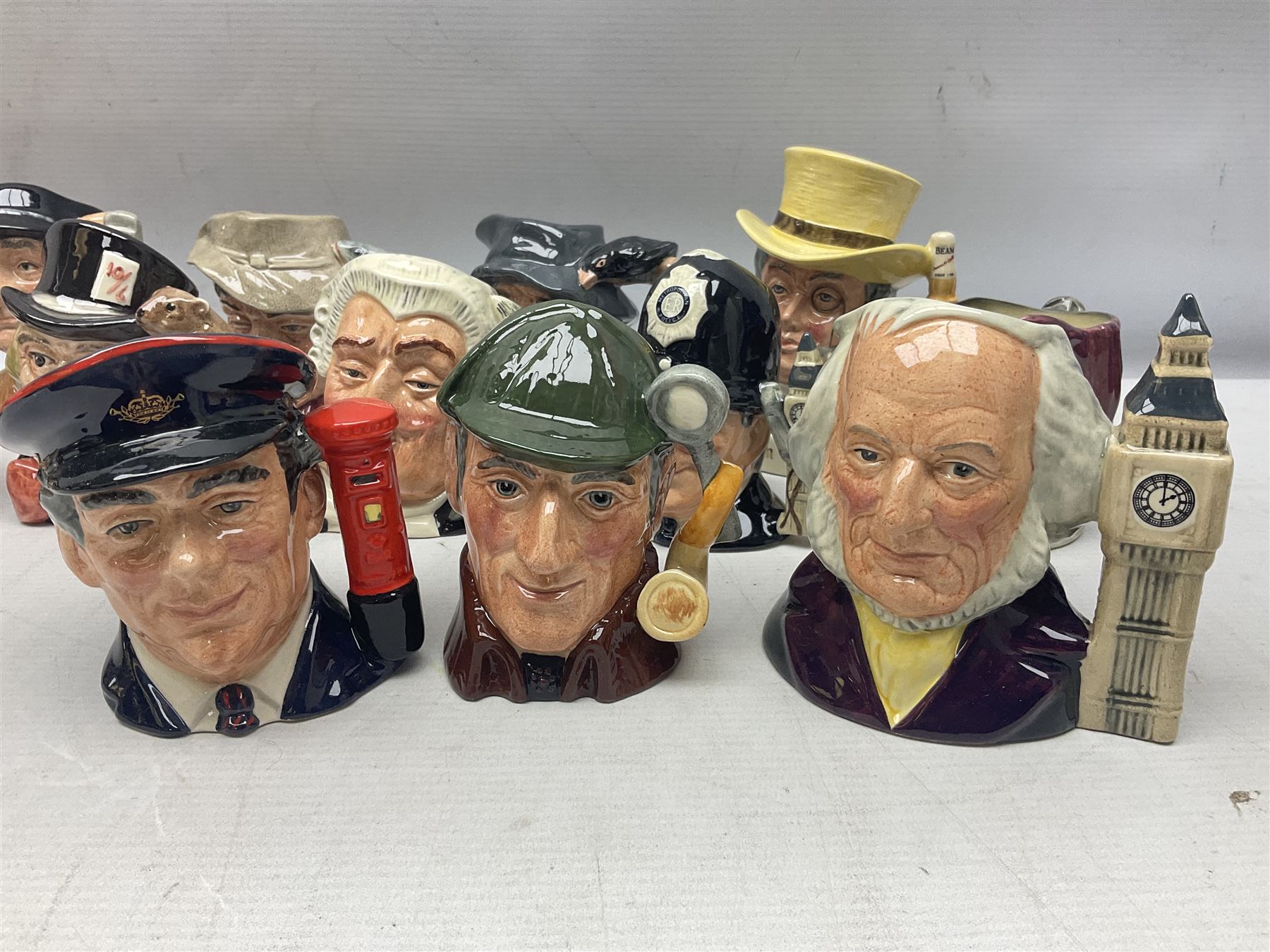 Large collection of Royal Doulton miniature character jugs, to include The Postman D6801, The London 'Bobby' D6762, Old Salt, D6554, Sir Henry Doulton D6703 etc  