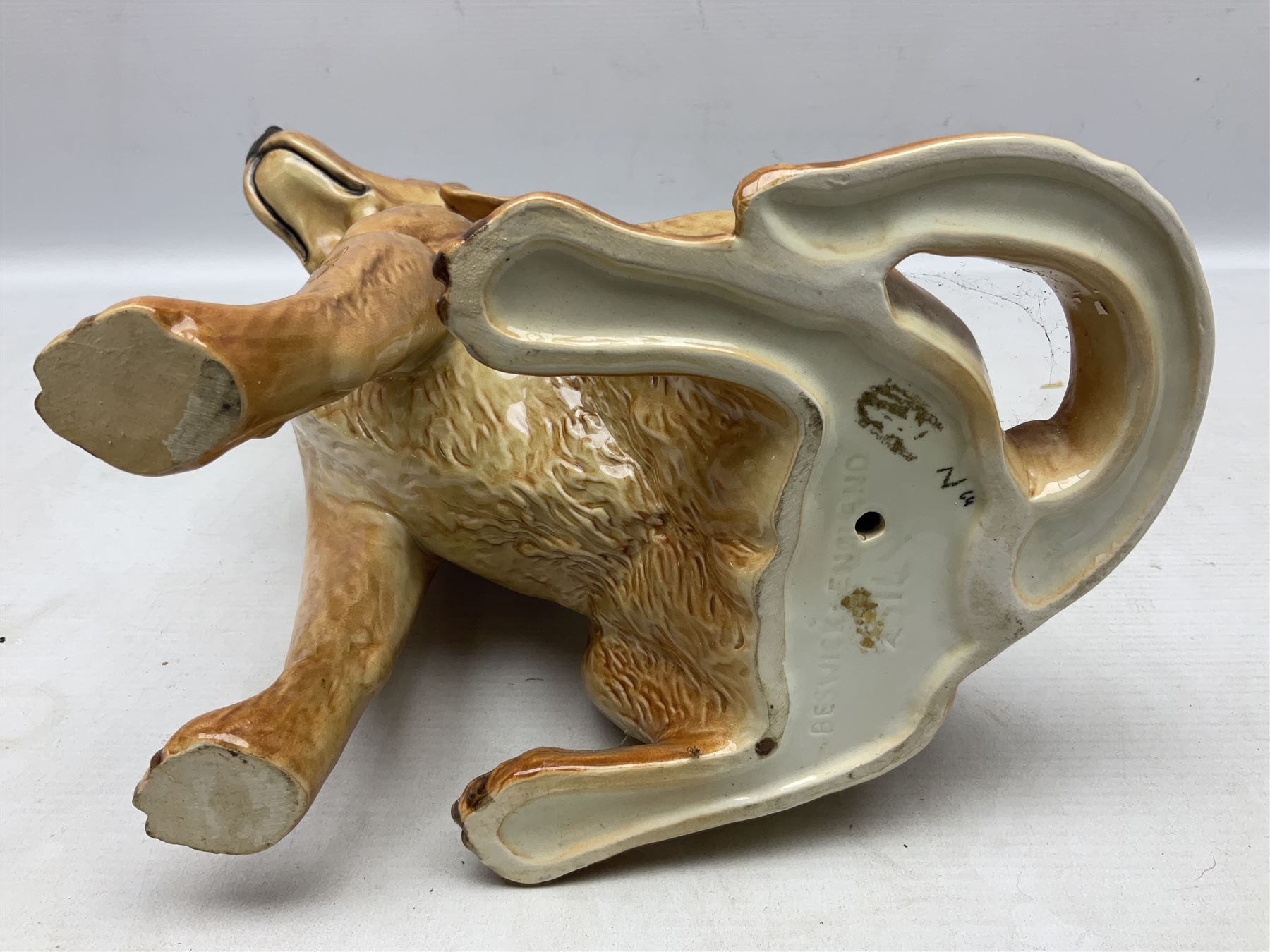 Large Beswick fire side figure of a yellow labrador, modelled seated, no. 2314, with impressed marks beneath, H34cm