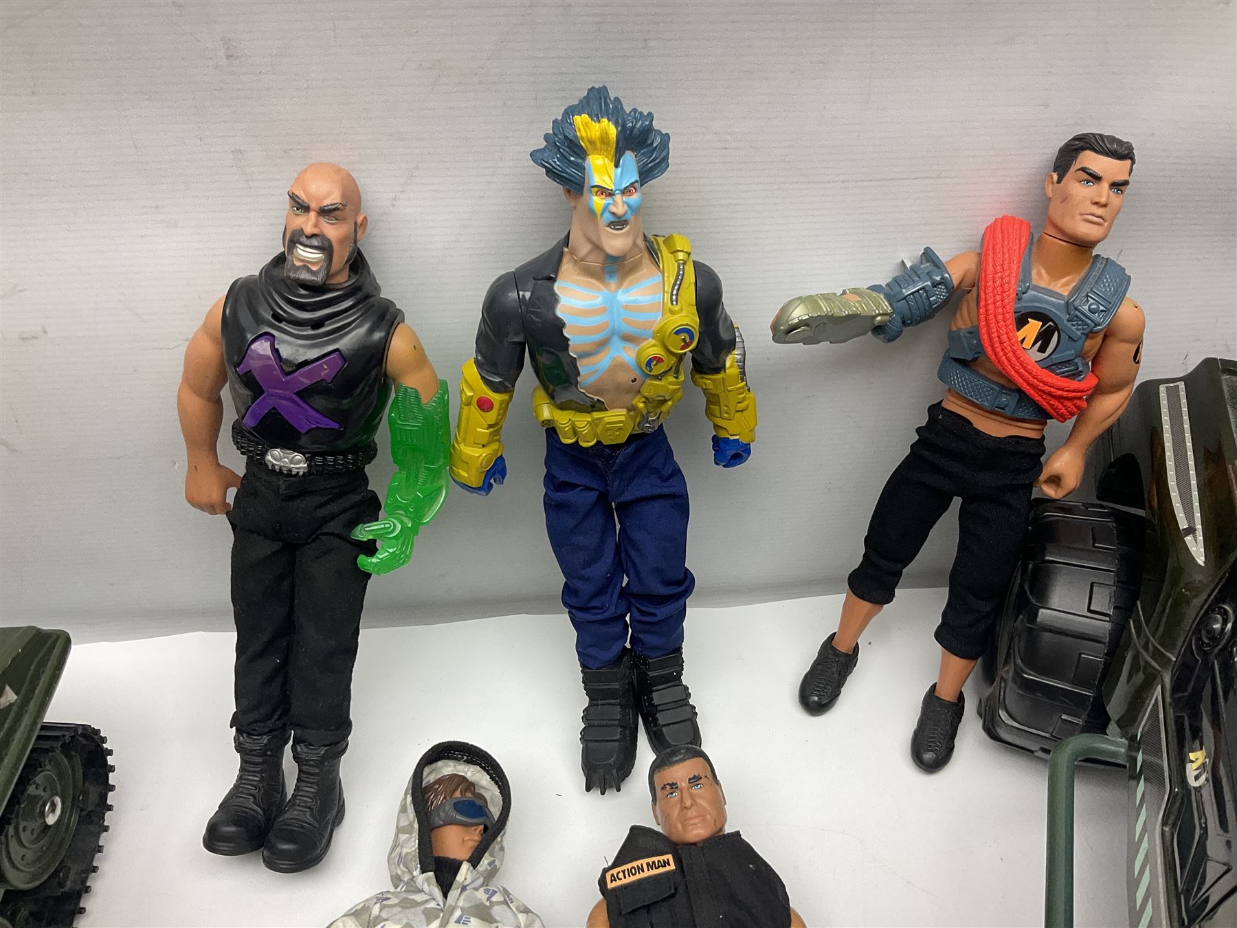 Action Man - Hasbro Strike Force Battle Tank by Sunny Smile; jeep; ten various period dressed figures; and quantity of weapons and other accessories including motorcycle etc