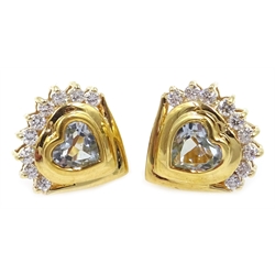  Pair of 18ct gold aquamarine and diamond heart stud earrings, stamped 18K 750  