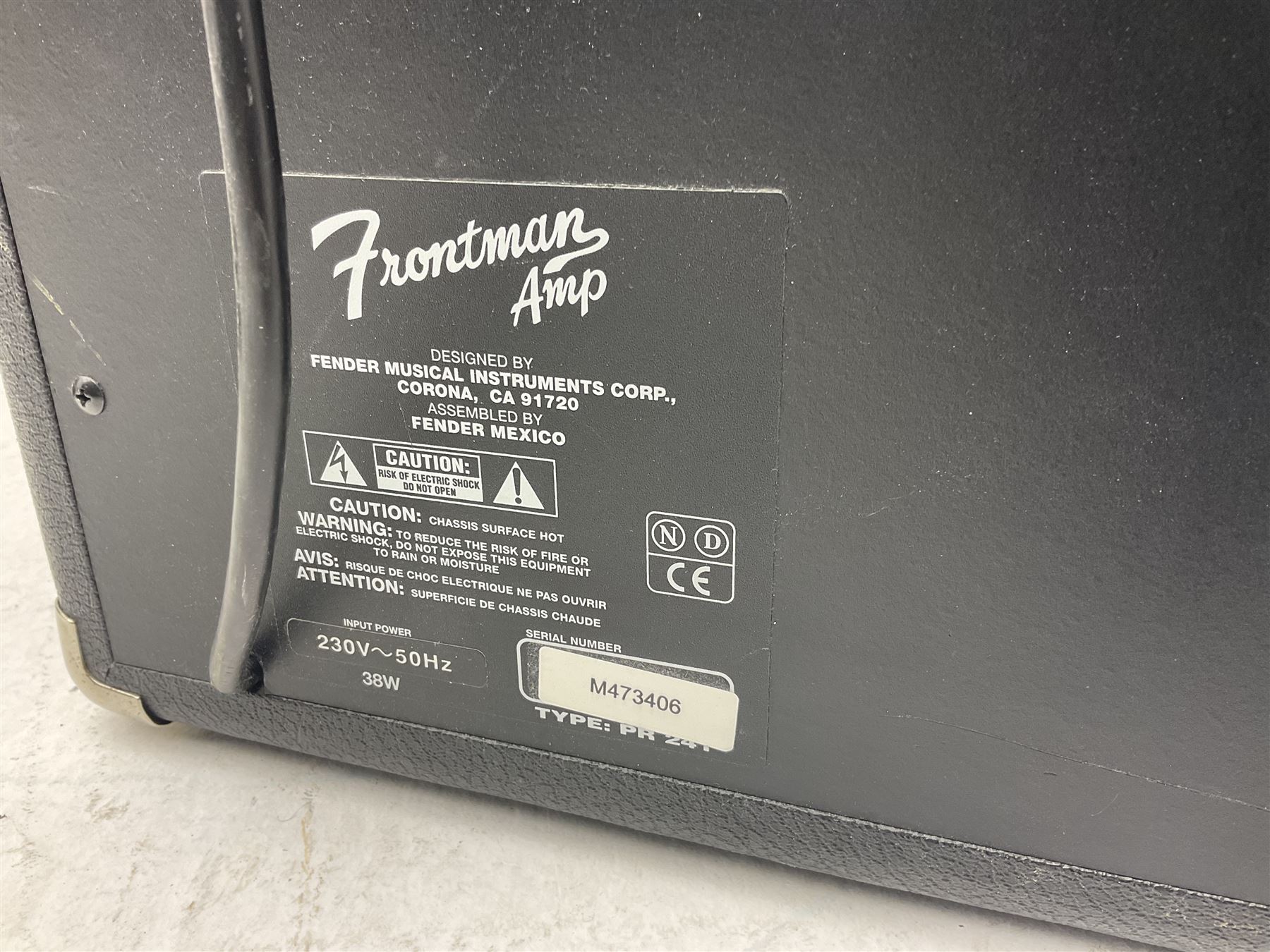 Fender style sunburst electric guitar with manuscript mark 'Zenta Stratocaster 1963' L97cm; in hard carrying case; another similar unmarked sunburst electric guitar; in gig bag; and Fender Frontman Amplifier, serial no.M473406 (3)