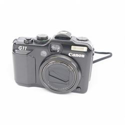 Canon PowerShot G11 digital camera serial no. 9015106423, in a soft shell case with user guide