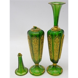  Pair late 19th century Bohemian emerald green glass vases, tapered hexagonal bodies, gilt relief carved facets on vermicule ground, below trumpet neck and circular base (one a/f), H30cm   