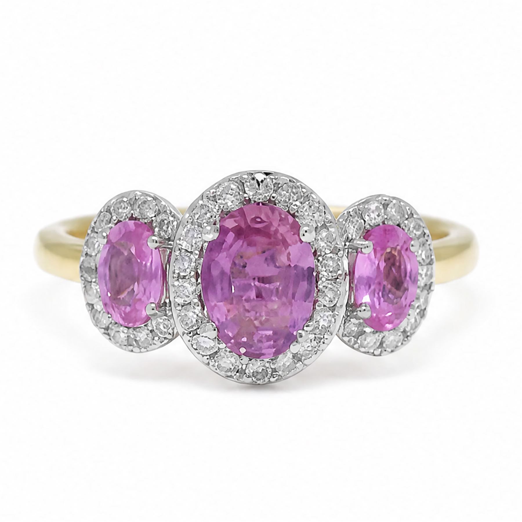 18ct gold pink sapphire and diamond trilogy ring, three oval cut sapphires surrounded by round brilliant cut diamonds, hallmarked, total sapphire weight approx 1.45 carat, total diamond weight approx 0.25 carat