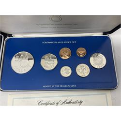 Four British Virgin Islands proof coin sets, comprising First Coinage of the British Virgin Islands 1973 proof six coin set, containing silver one dollar coin, 1977 and 1979 proof sets, containing high denomination silver coins, and The Royal Coronation Jubilee 1977 six coin silver proof set, each minted at the Franklin Mint, all cased with certificates, and a Solomon Islands 1978 proof seven coin set, containing silver five dollar coin, minted at the Franklin Mint, cased with certificate (5)