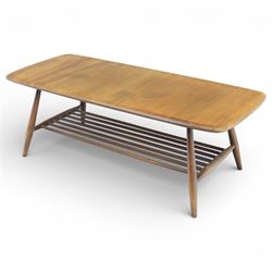 Ercol - Dark elm coffee table, plank top with chamfered edges, over a central under tier spindles, tapered legs 