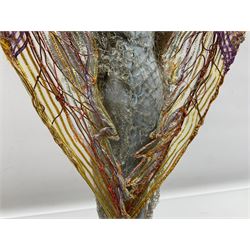 Anna Meszaros Hungary - hand made needlework figurine of an Angel with metallic lace full length dress and open threadwork wings; on moulded base H45cm Auctioneer's Note: Anna Meszaros came to England from her native Hungary in 1959 to marry an English businessman she met while demonstrating her art at the 1958 Brussels Exhibition. Shortly before she left for England she was awarded the title of Folk Artist Master by the Hungarian Government. Anna was a gifted painter of mainly portraits and sculptress before starting to make her figurines which are completely hand made and unique, each with a character and expression of its own. The hands, feet and face are sculptured by layering the material and pulling the features into place with needle and thread. She died in Hull in 1998.