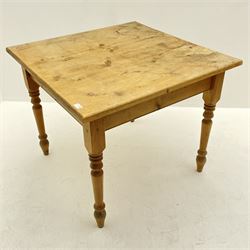 Square pine dining table, raised on turned supports 