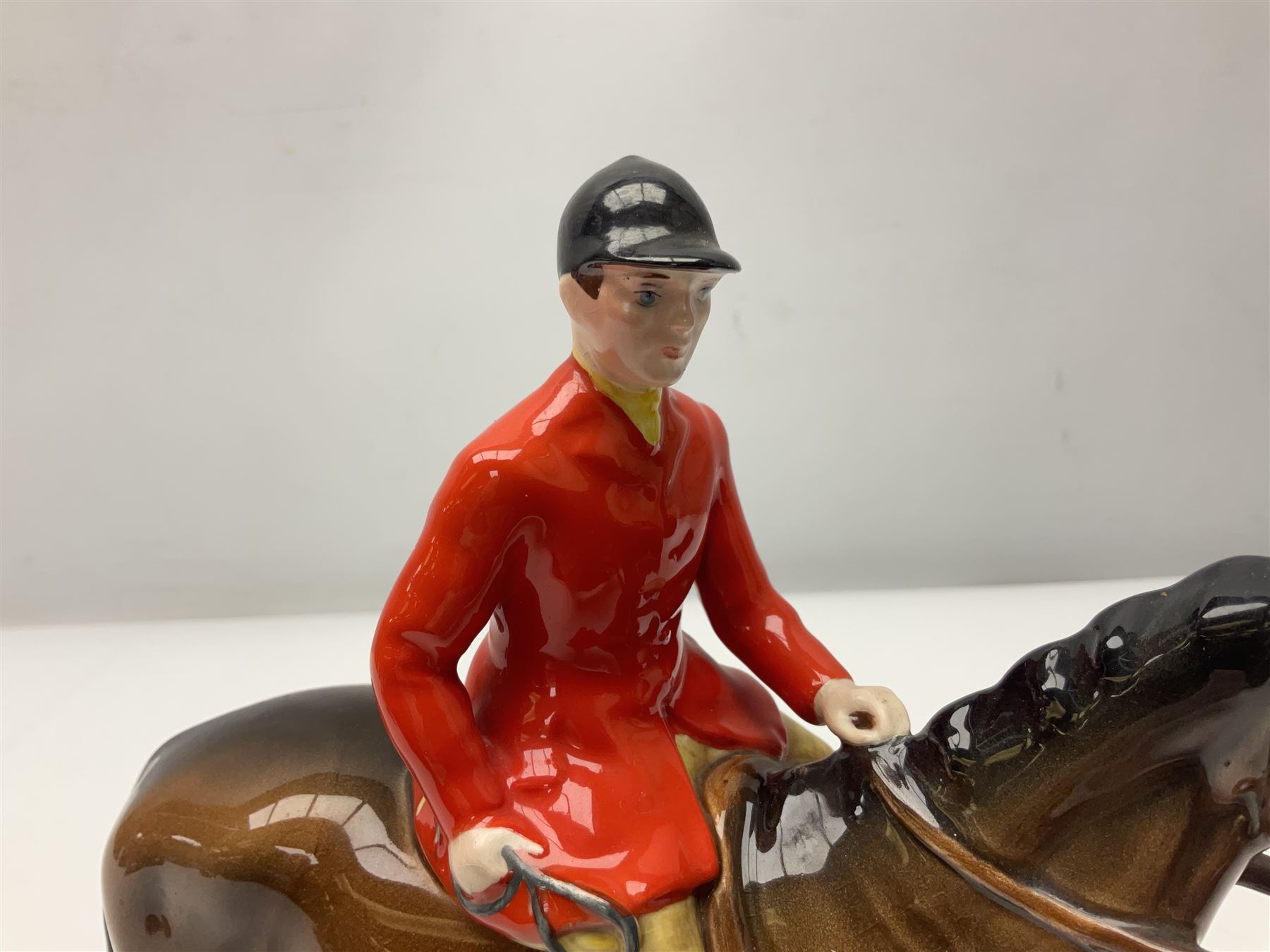 Beswick huntsman upon a bay horse no. 1501, with printed mark beneath, H22cm