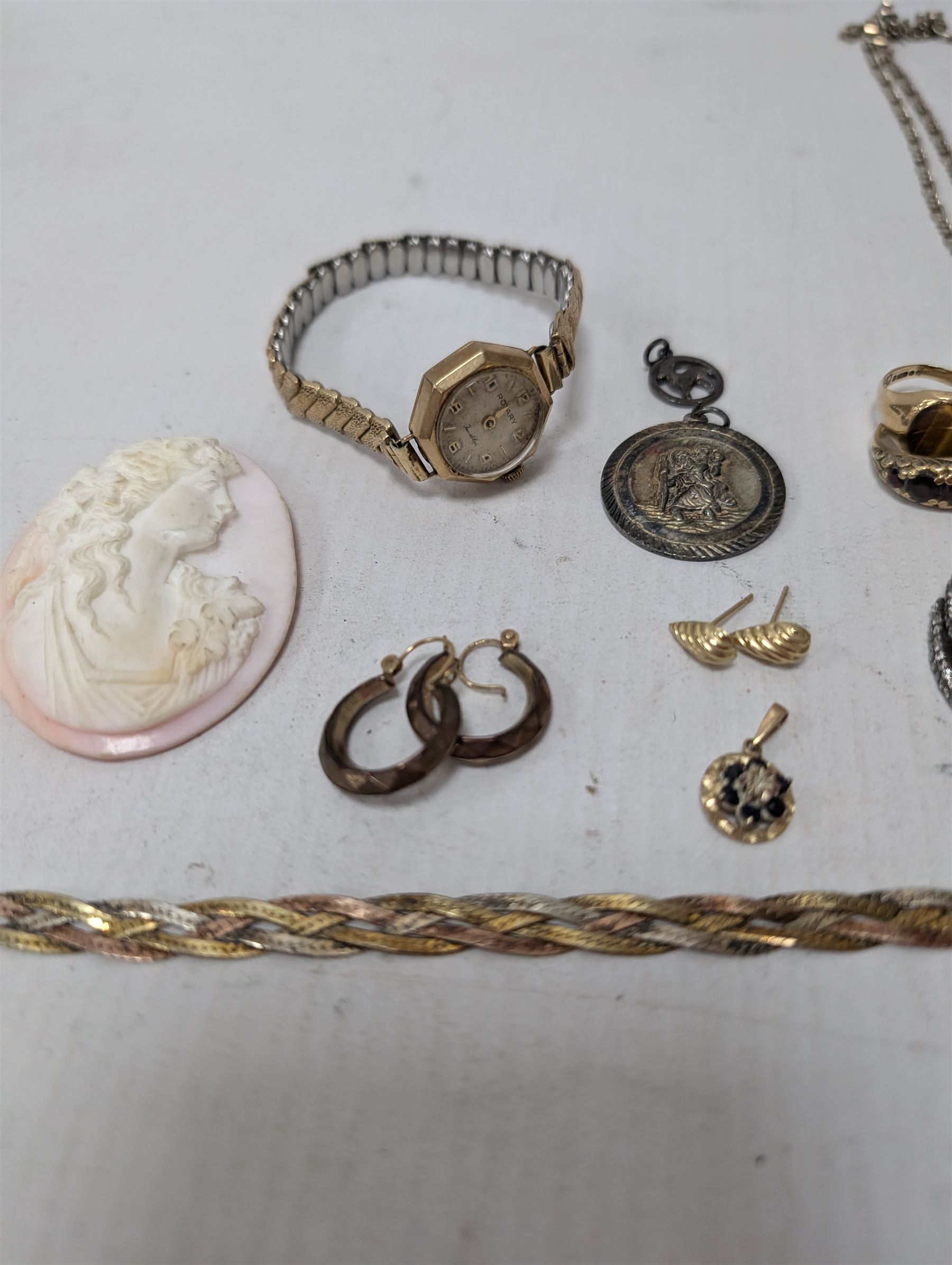 Georg Jensen silver St Christoper's pendant, 9ct gold jewellery including earrings and stone set ring, cameo, silver jewellery and a 9ct gold wristwatch, on expanding gilt strap