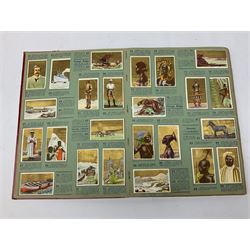 Magnus Laurie: The West Riding Territorials in the Great War. 1920: German Haus Neuerburg cigarette card album entitled Der Bunte Rock depicting 19th century military uniforms; French Chocolat Aiglon trade card album including some military costumes; and a cigarette card album, some of military interest (4)