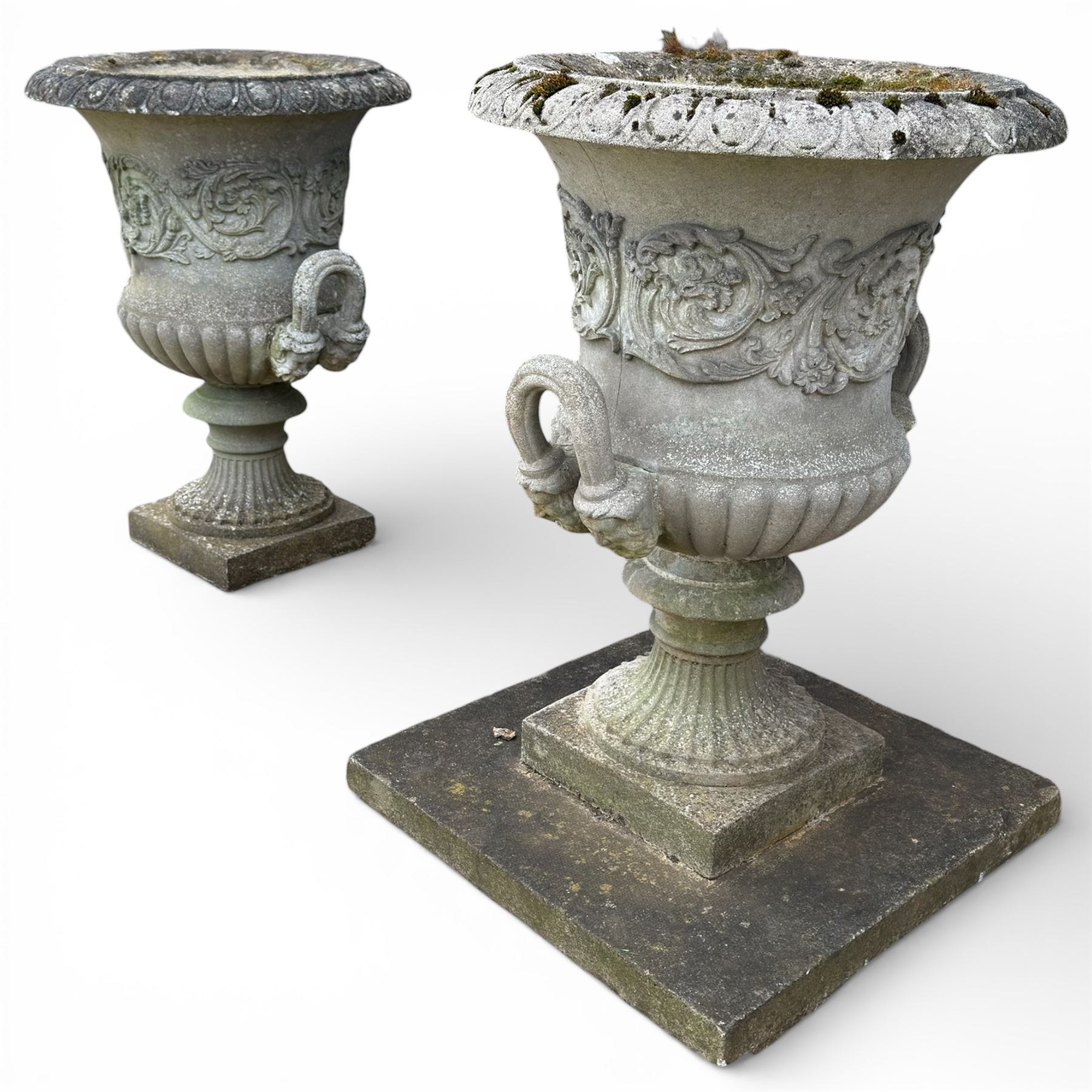 Pair of large stone Campana urns on square bases