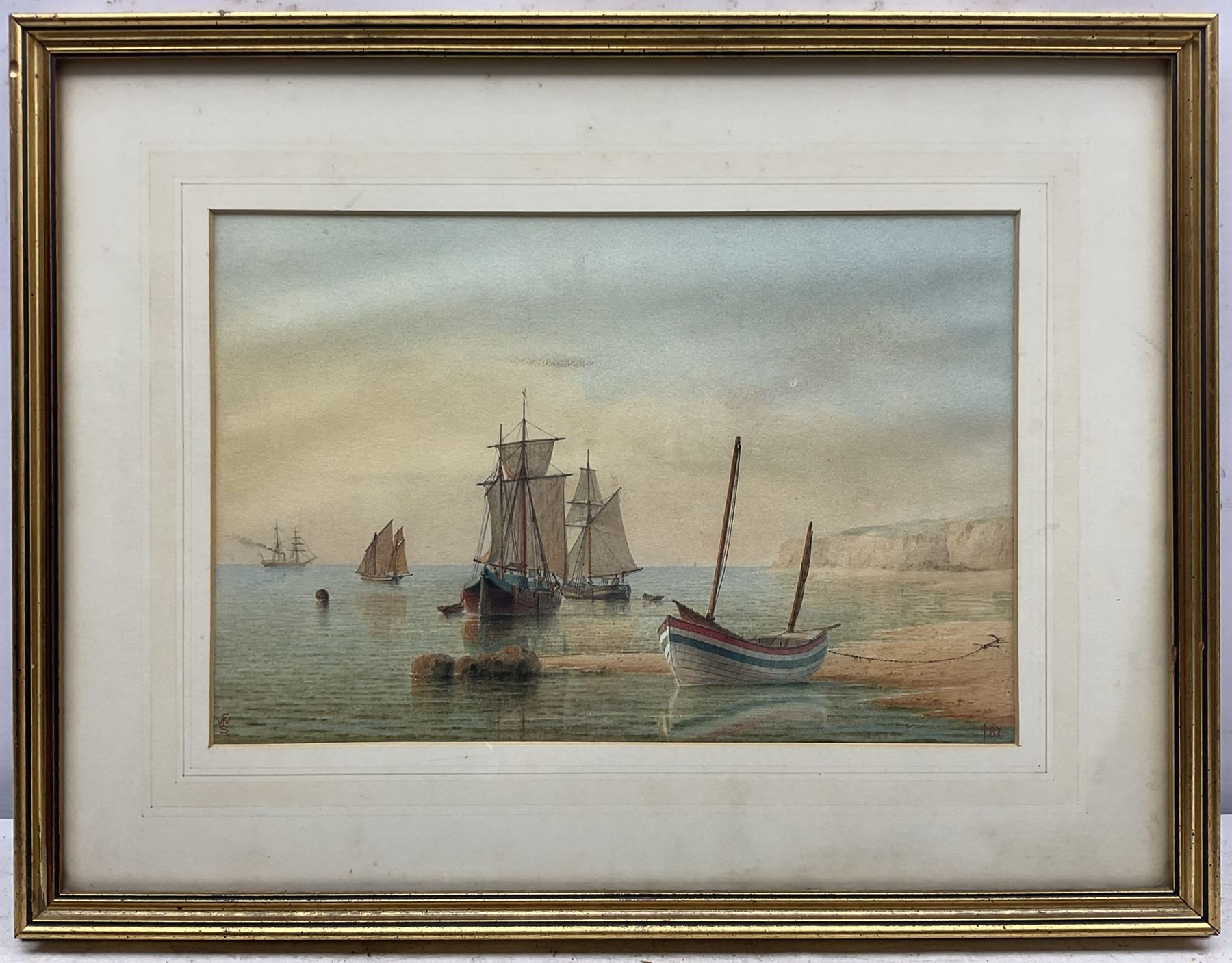 William Frederick Settle (Hull 1821-1897): Fishing Boats on the Shore at Flamborough, watercolour signed with monogram and dated '87, 22cm x 34cm