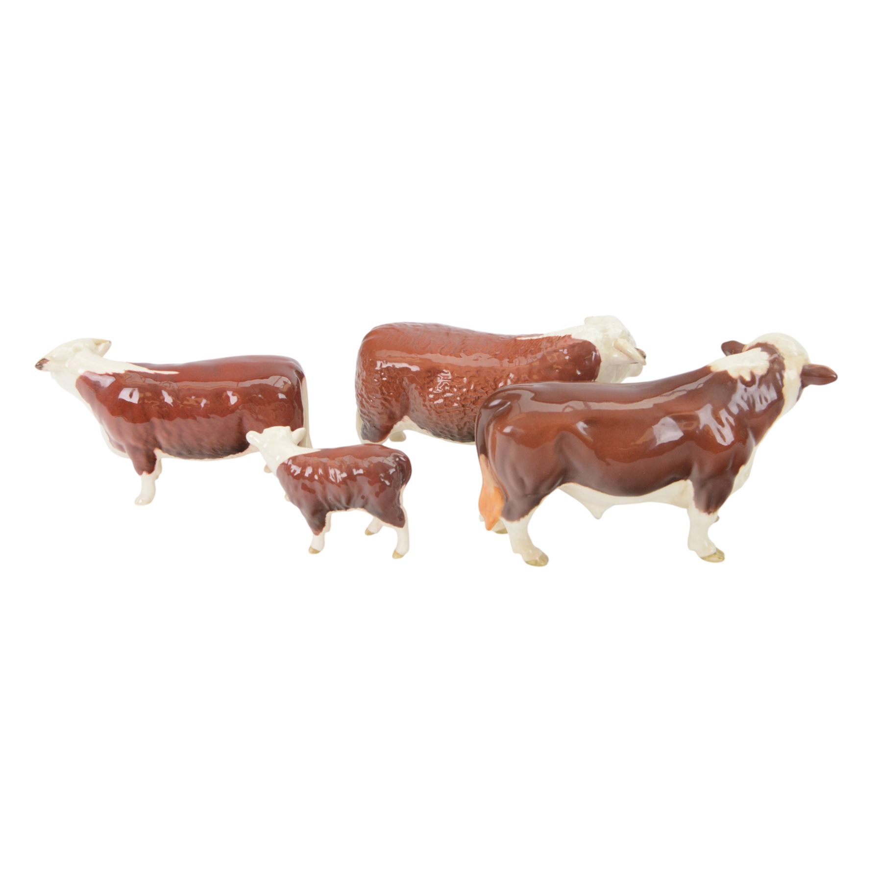 Beswick Hereford cows family group, comprising Bull, Ch. of Champions 1363, Hereford cow Ch of Champion 1360, and calf 1827, together with another Hereford Bull