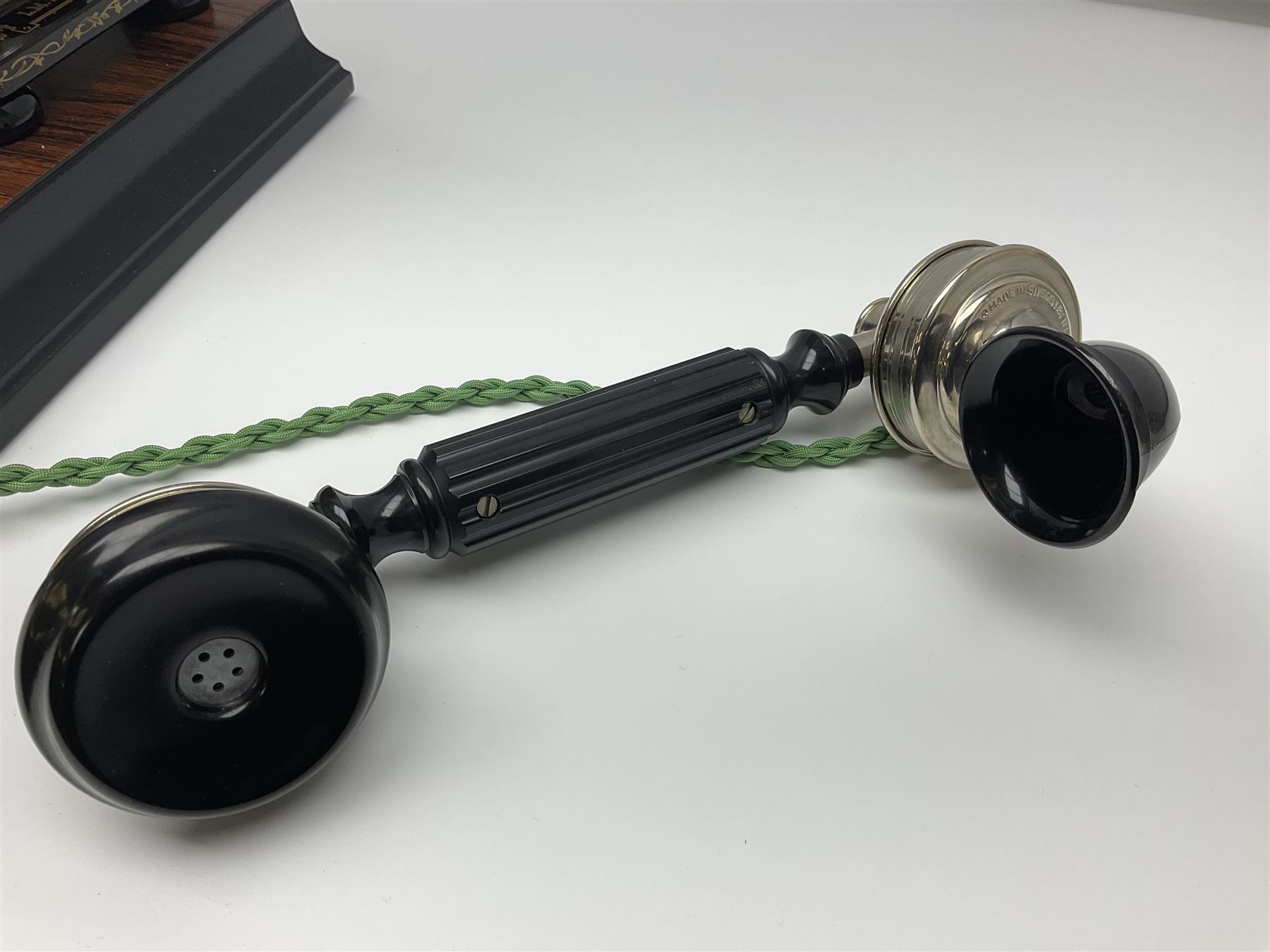 LM Ericsson of Sweden reproduction skeletal telephone, commemorating the centenary of the first 'Tax' in 1892, with gilded details on square walnut base with keypad and brass plaque beneath numbered 1892-09305, H35cm