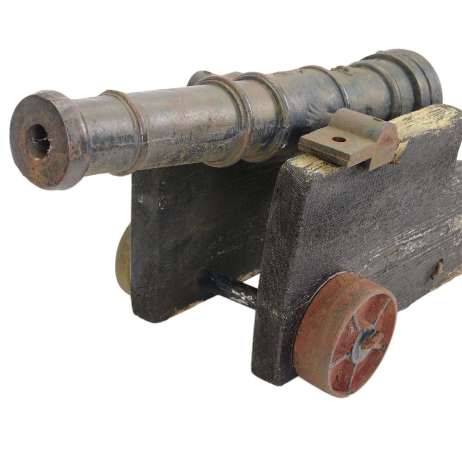 Victorian model of a ship's cannon, the ringed iron barrel with flared muzzle upon an
wooden carriage with four iron wheels, L54cm