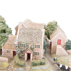 Four Lilliput Lane models, comprising Oakwood Smithy, We Plough the Fields and Scatter, Bluebell Farm and Highghyll Farm