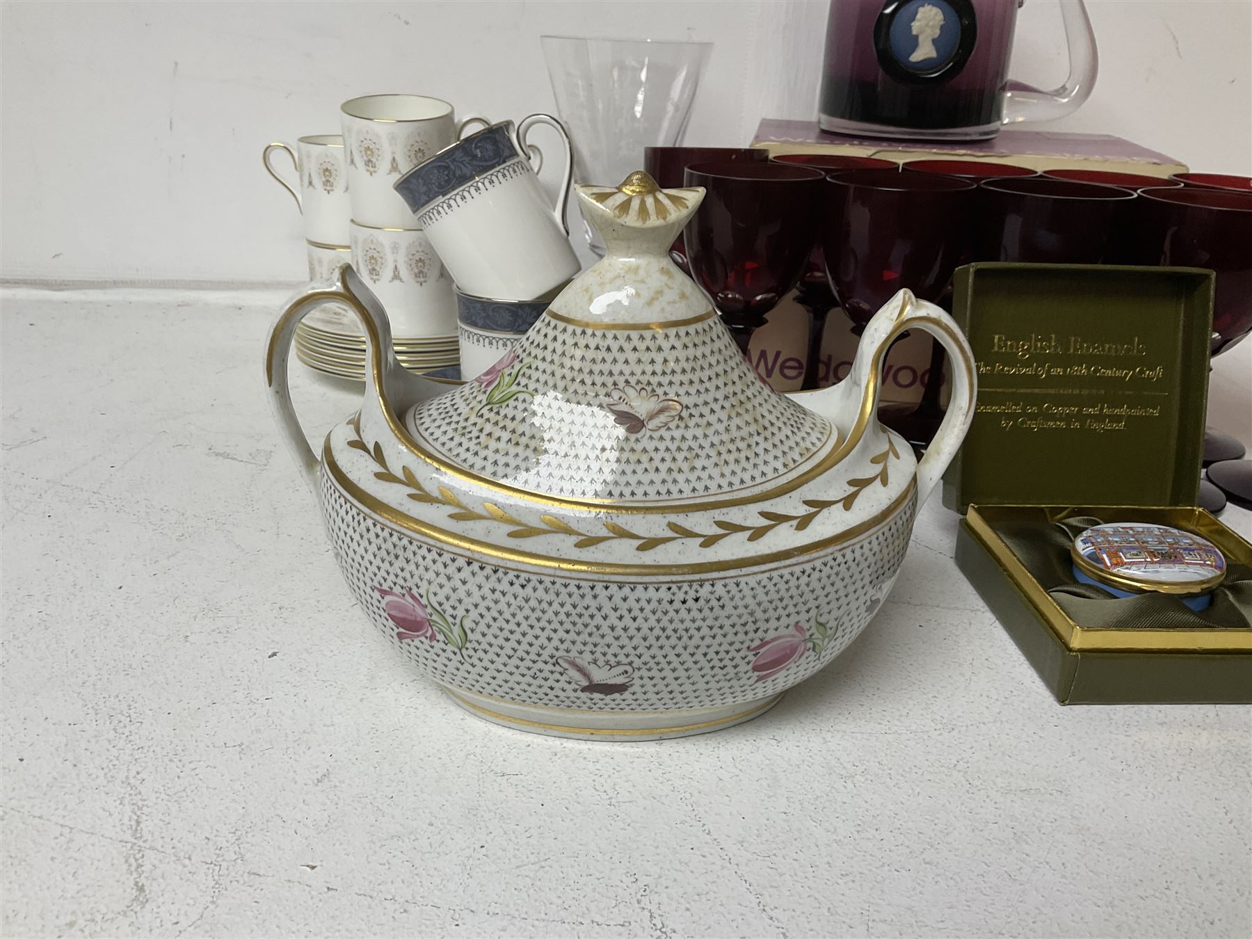 Twin handled sucrier with cover, in the manner of Thomas Grainger for Royal Worcester, together with Wedgwood Medina pattern coffee cans and saucers, a set of ten ruby glasses and a Wedgwood cameo glass tankard etc