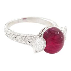 18ct white gold pink tourmaline and diamond ring, single oval cabochon cut tourmaline of approx 4.75 carat, set with a half moon cut diamond either side, to engraved laurel leaf design shoulders