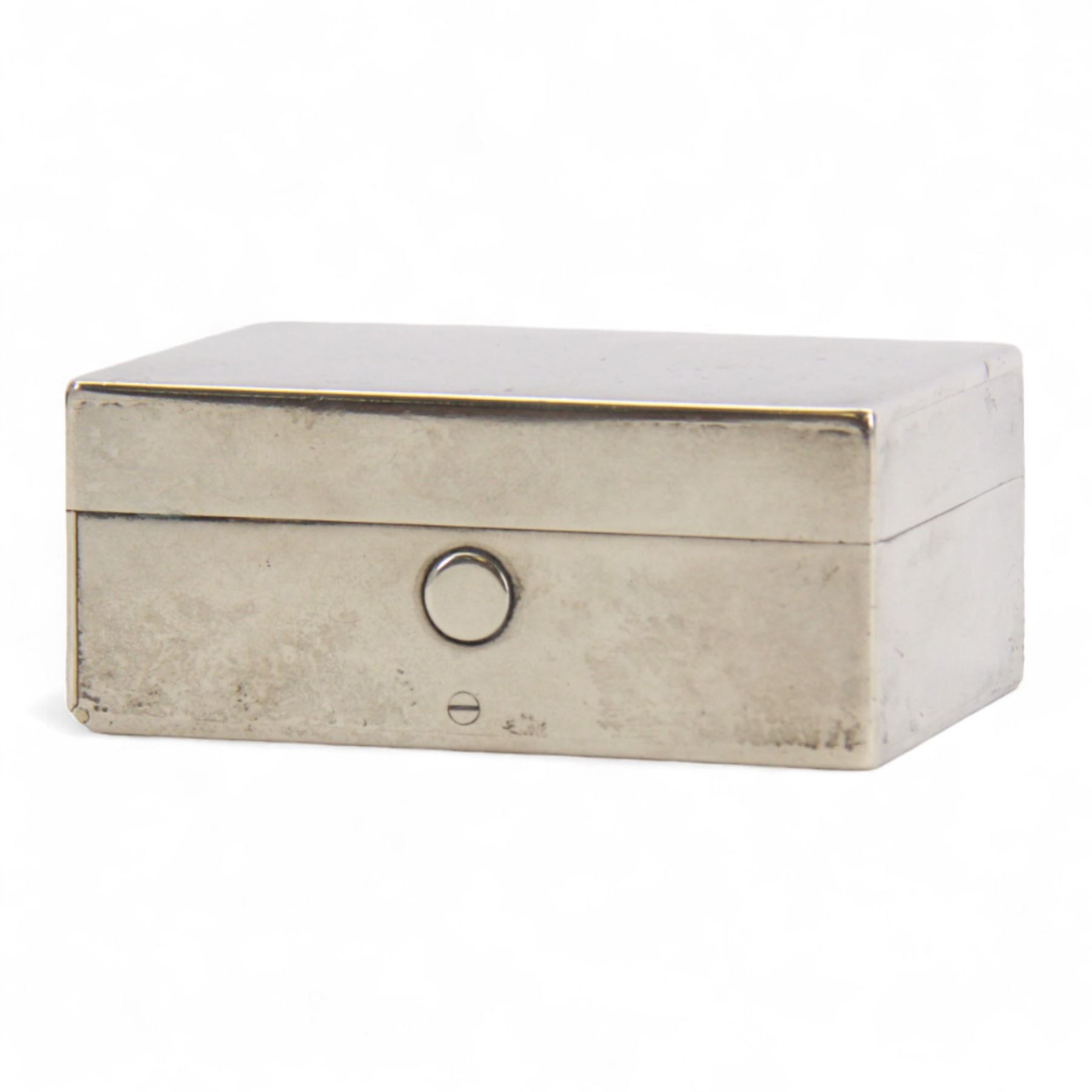 Victorian silver travelling desk compendium, of plain rectangular form, the hinged cover opening to reveal a fitted gilt interior containing inkwell, vesta case, fold down candle holder and seal tray, hallmarked Thomas Johnson I, London 1871, also bearing retailer mark for Asprey Bon Street, H3.5cm W8cm D5.5cm