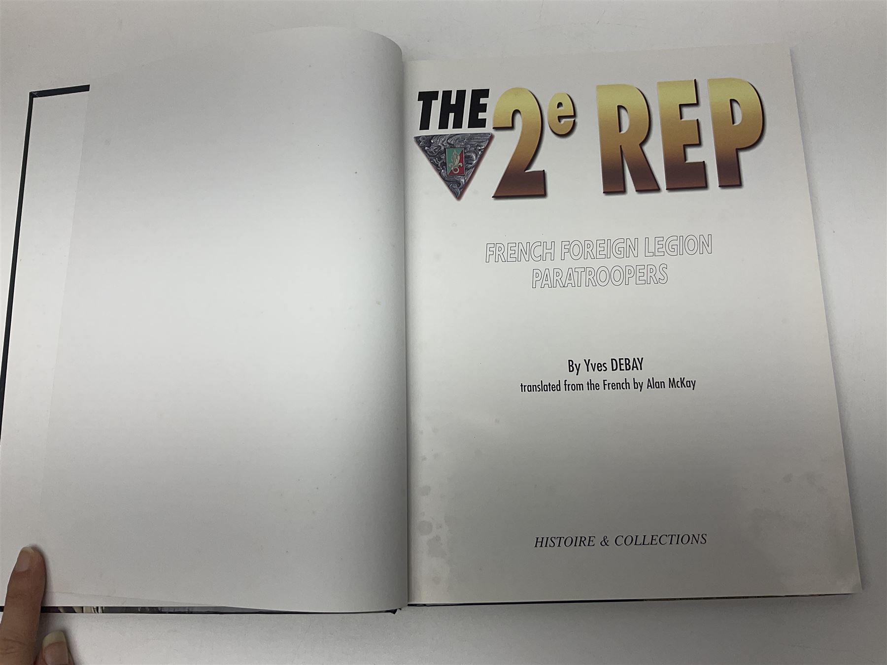 Seven military reference books - Histoire Mondiale Des Parachutistes; Yves Debay: French Foreign Legion  Paratroopers; Bragg & Turner: Parachute Wings; Barney White-Turner: Horse Guards; and three works on uniforms/standards (7)