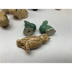 Collection of Sylvac and similar animal figures, including rabbits, hares and dogs, together with Falcon budgie vase, etc 