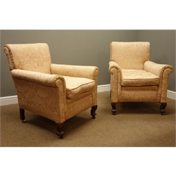  Early 20th century beech framed three piece lounge suite, two seat settee (W162cm, D75cm), and pair deep seat armchairs (W82cm, D85cm), waved and moulded feet with castors, all with sprung seats and upholstered seat cushions in pale pink floral fabric  