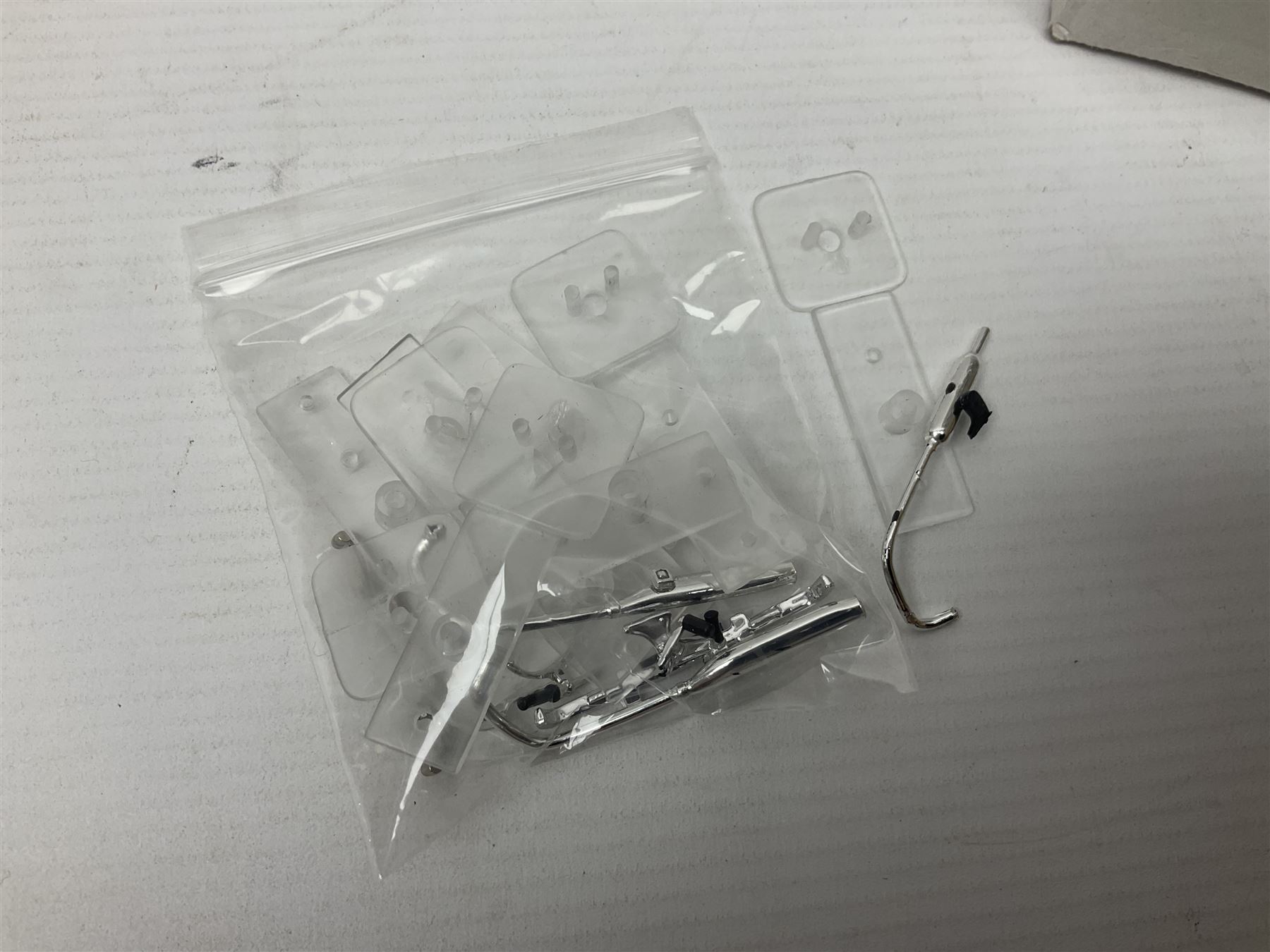 Over forty 1:76 scale die-cast models of cars and commercial vehicles; some boxed; and eight small scale models of motorcycles; all unboxed