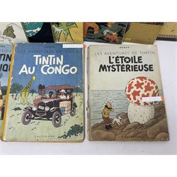 Twenty one first edition Herge, 'The Adventures of Tin Tin' books published by Casterman Bruxelles, with French text and coloured comic strip illustrations throughout; comprising Tintin Au Congo 1946, Tintin En Amerique 1946, Les Cigares du Pharaon 1955, Le Lotus Bleu 1946, L'Oreille Cassee 1943, L'ile Noire 1943, Le Sceptre d O'ttokar 1947, Le Crabe Aux Pinces D'or 1943, L'Etoile Mysterieuse 1942, Le Secret de la Licorne 1943, Le Tresors de Rackan Le Rouge 1945, Les 7 Boules de Cristal 1948, Le Temple du Soleil 1949, Au Pays de L'Or Noir 1950, Objectif Lune 1953, On a Marche sur la Lune 1954, L'Affaire Tournesol 1956, Coke en Stock 1958, Tintin au Tibet 1960, Les Bijous de la Castafiore 1963 and Vol 714 Pour Sydney 1968
