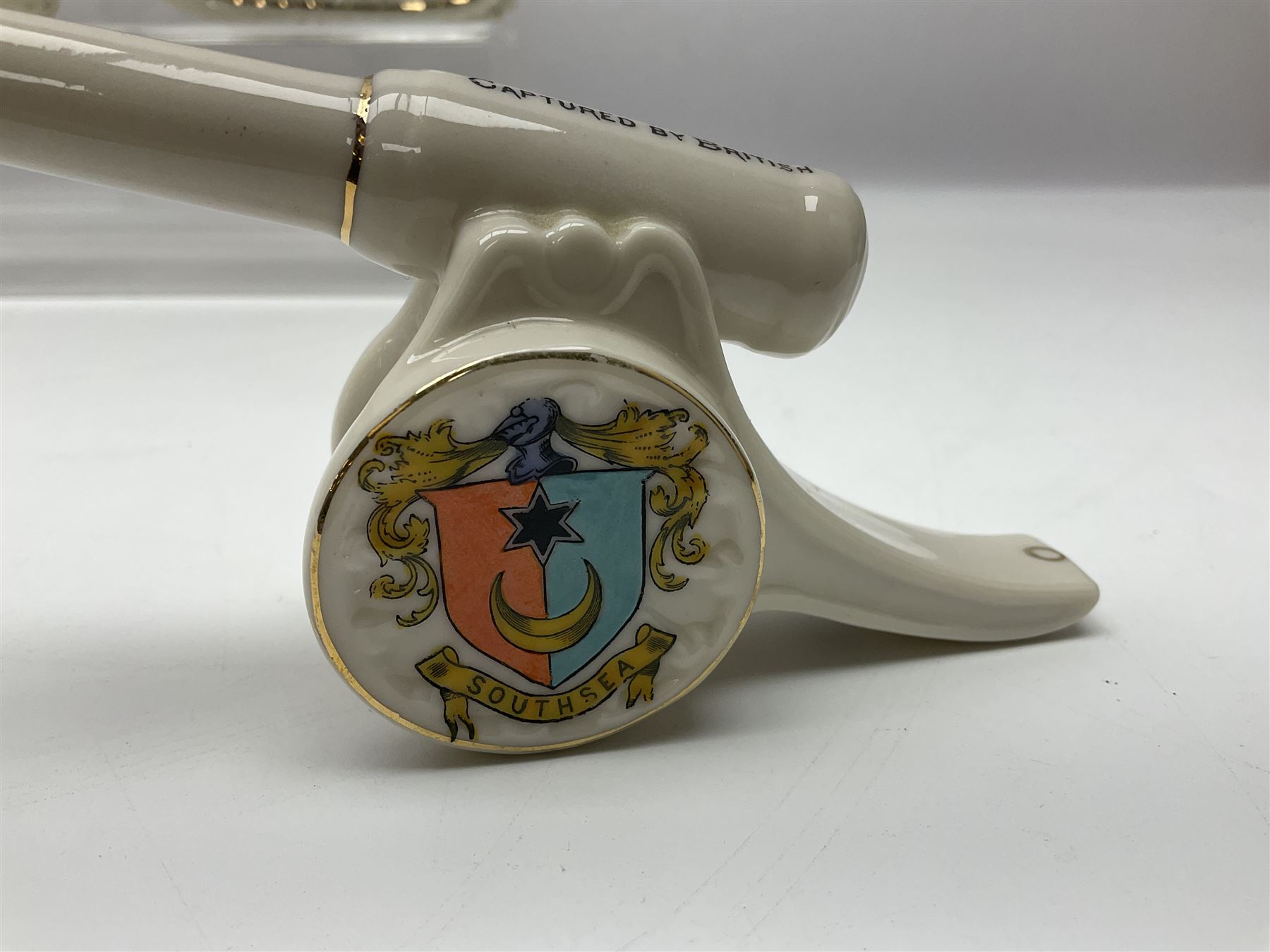 Ten WW1 crested china military models of tanks and field guns; various makers including Goss, Grafton China, Arcadian China, Savoy China etc; various crests including Portsmouth, Brighton, Pendleton, Paignton, Cowes, Flamborough etc (10)