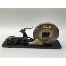 Art Deco style marble and anodised spelter three-piece clock garniture, model with recumbent gazelle, centre piece L52cm.  