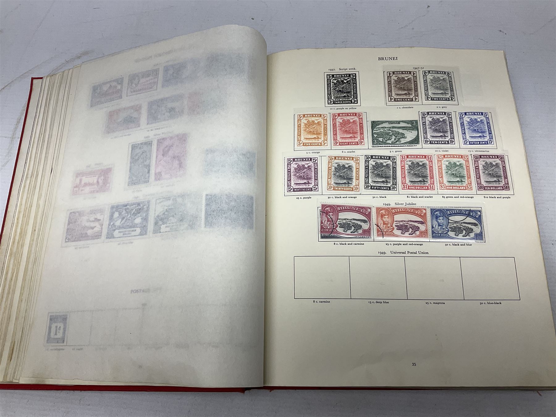 Single album collection of King George VI stamps, including Aden, Antigua, Ascension, Australia, Bahamas, Bahrain, Barbados, Basutoland, Bechuanaland, Bermuda, British Solomon Islands, Brunei, Burma, Cayman Islands, Dominica, Falkland Islands, Gambia, Gilbert and Ellice Islands, Gold Coast, Great Britain 1939-48 set to one pound including ten shilling dark blue, Grenada, Hong Kong, India, Ireland, Jamaica, Leeward Islands, Malta, Mauritius, New Zealand etc