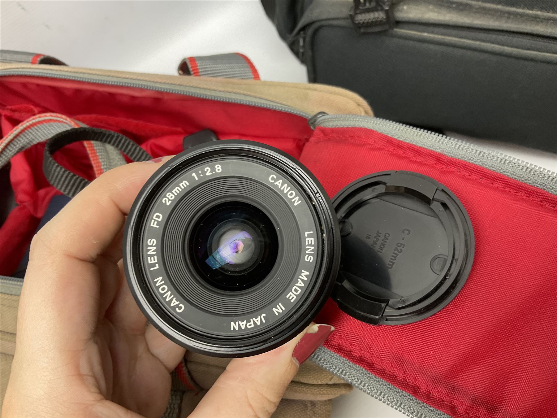 Canon T50 camera body, together with lenses and other camera equipment, projector etc