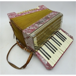  Italian Alvari piano accordion with pink pearline case, fifteen keys and twenty-four buttons, in carrying case with music  