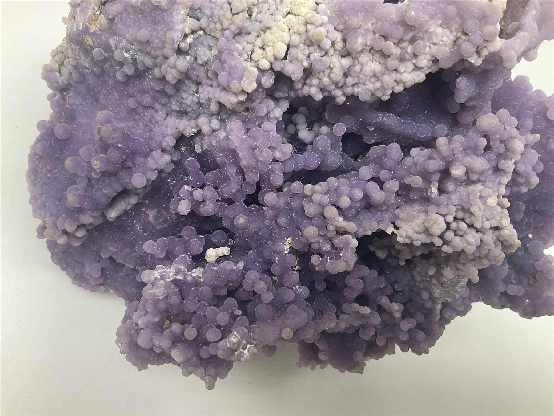 Grape agate cluster, formed of spherical quartz crystals, in purple tones, H15cm, L20cm