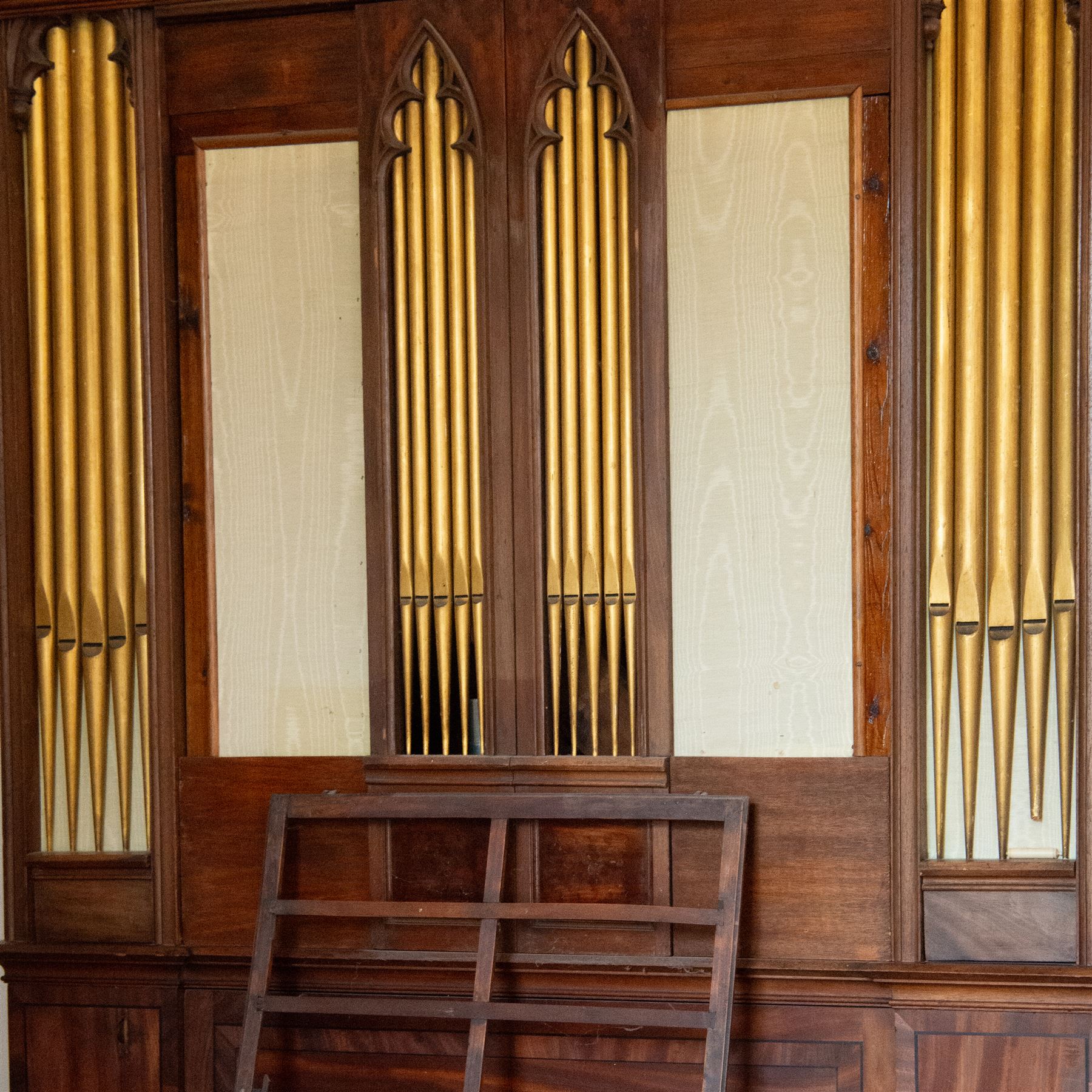 Mid-18th century Johannes Schnetzler (John Snetzler) Chamber Organ 1742
Single manual chamber organ, five octave keyboard with 58 keys GG-f3, A=427, with ebonised naturals and ivory faced sharps. With six speaking stops, Open Diapason, Twelfth, Cornet, Stopped Diapason, Flute and Fifteenth. Crank foot operated single rise reservoir. Case with alterations from the early part of the 19th century including the “gothic” arches and rectangular watered silk panels. Some of the pipework has been replaced, all the pipework is however present and the organ plays, however the pipe work is dirty and in need of attention, the action and stop work is also in need of some repair, adjustment and regulation. Thought to be the oldest Schnetzler chamber organ in Great Britain and is referred to in some sources as possibly owned by Handel who lived in London when Schnetzler worked there. However there is no documentary evidence to confirm this. Full notes and technical details regarding the background, restoration and history of this instrument can be found in The Harley Foundation Historical and Technical Report No 29 (2005) by Edward Bennett and Martin Goetze. This report can be downloaded 
HERE.

Given the intricate nature of these historic instruments, specialist support will be available if required – including a professional organ builder prepared to undertake full dismantling and reassembly – to assist successful buyers with safe removal and onward handling. Price upon application. 

This item has been registered for sale under section 10 of the APHA Ivory Act Reference GXAQ2W4S




