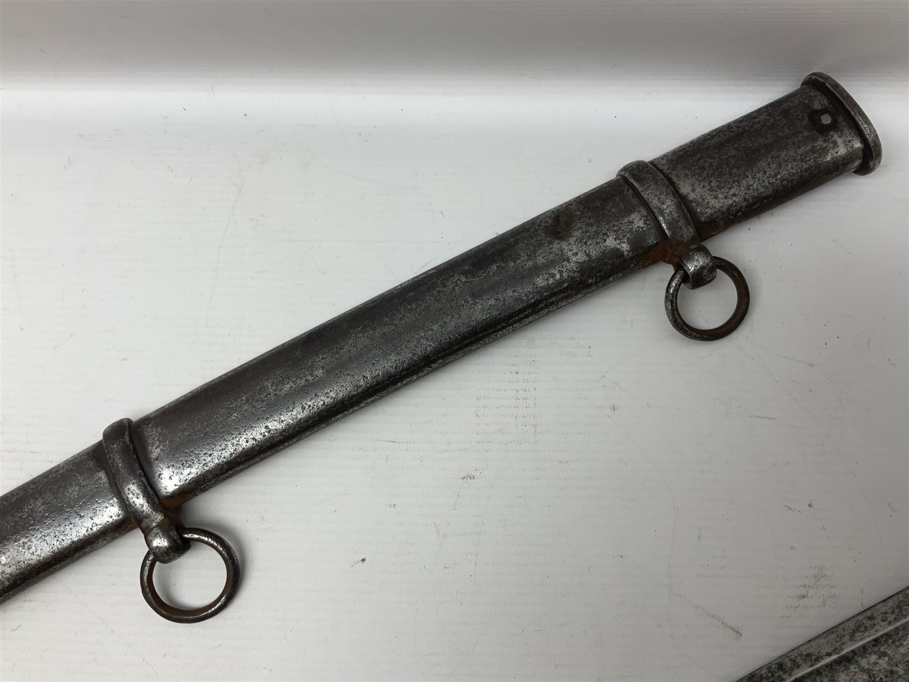 19th century French 1822 Pattern Light Cavalry trooper's sword with 88.5cm slightly curving fullered blade, brass three-bar hilt and wire-bound leather grip; in polished steel scabbard with two suspension rings L110.5cm overall