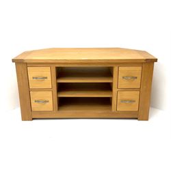 Light oak TV unit, two adjustable shelves flanked by four short drawers, stile supports 
