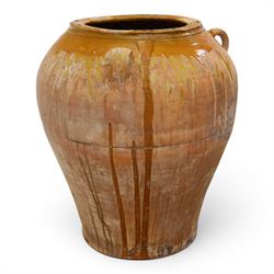Large Spanish terracotta olive jar, of typical baluster form with drip glaze decoration and three lug handles, with impressed mark fabrica de alfareria, H58cm