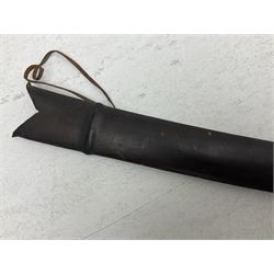 Late 19th/early 20th century Indian Tulwar sword with 81cm plain curving steel blade and iron hilt with extended langets, knucklebow and spiked pommel; in leather covered scabbard L100cm overall; and another Tulwar lacking scabbard in almost relic condition (2)