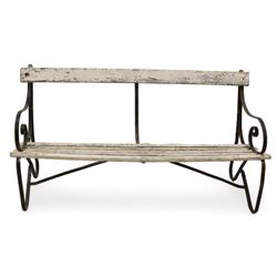 Early 20th century metal strapwork and wooden slatted bench, scrolled strapwork bench ends with painted wooden slats 