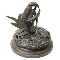 Japanese Meiji period bronze Koro, c.1870-1880, of squat baluster form, each foot with elaborate floral and mythical creature decoration, the body depicting two lions in chase, the rim with Greek key border, the pierced cover with eagle finial, Yoshida foundry mark to base, H50cm