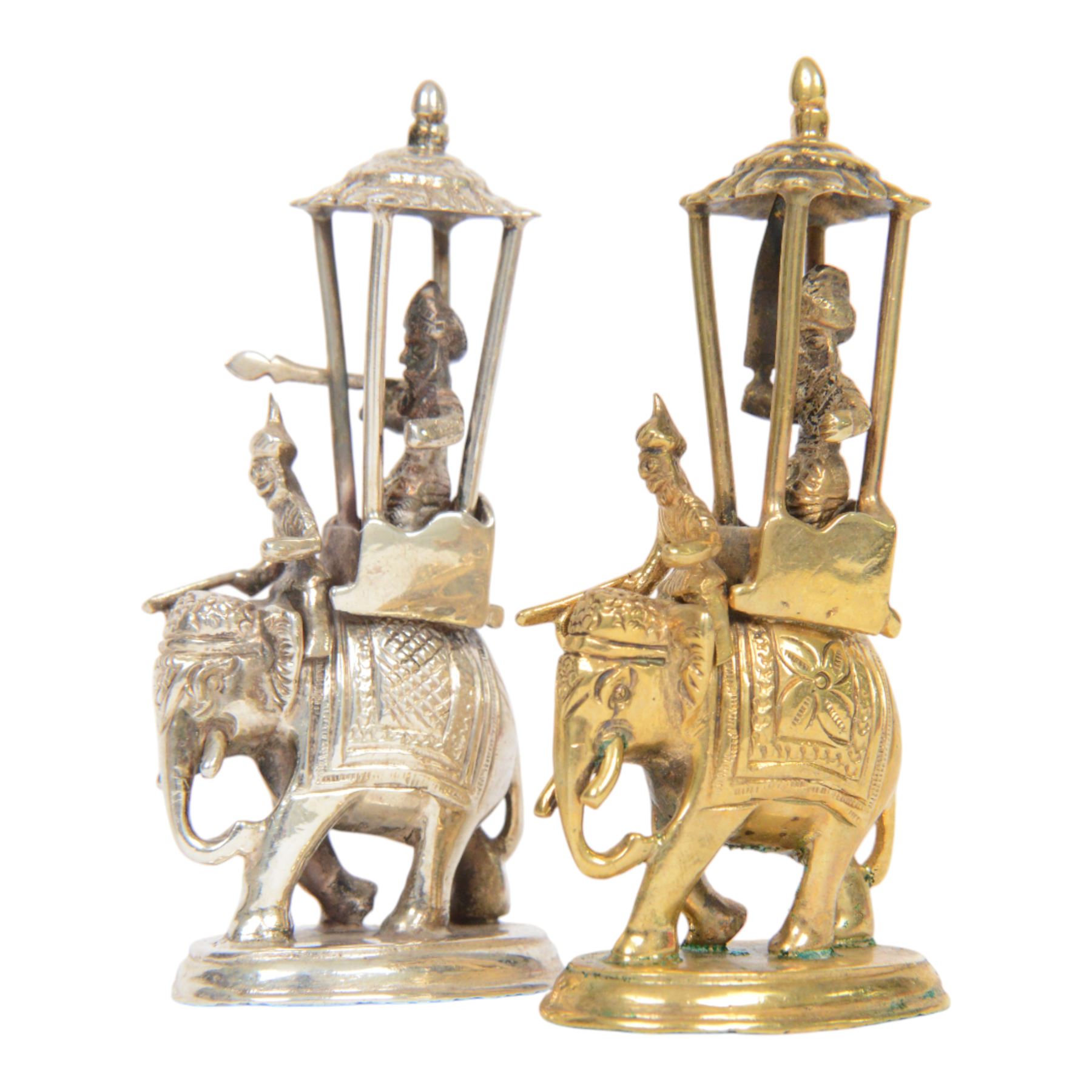 19th century Moghul Indian silver and silver gilt chess set, comprising thirty-two pieces, modelled as soldiers mounted upon elephants, camels and horses with the pawns on foot, unmarked, King H10cm