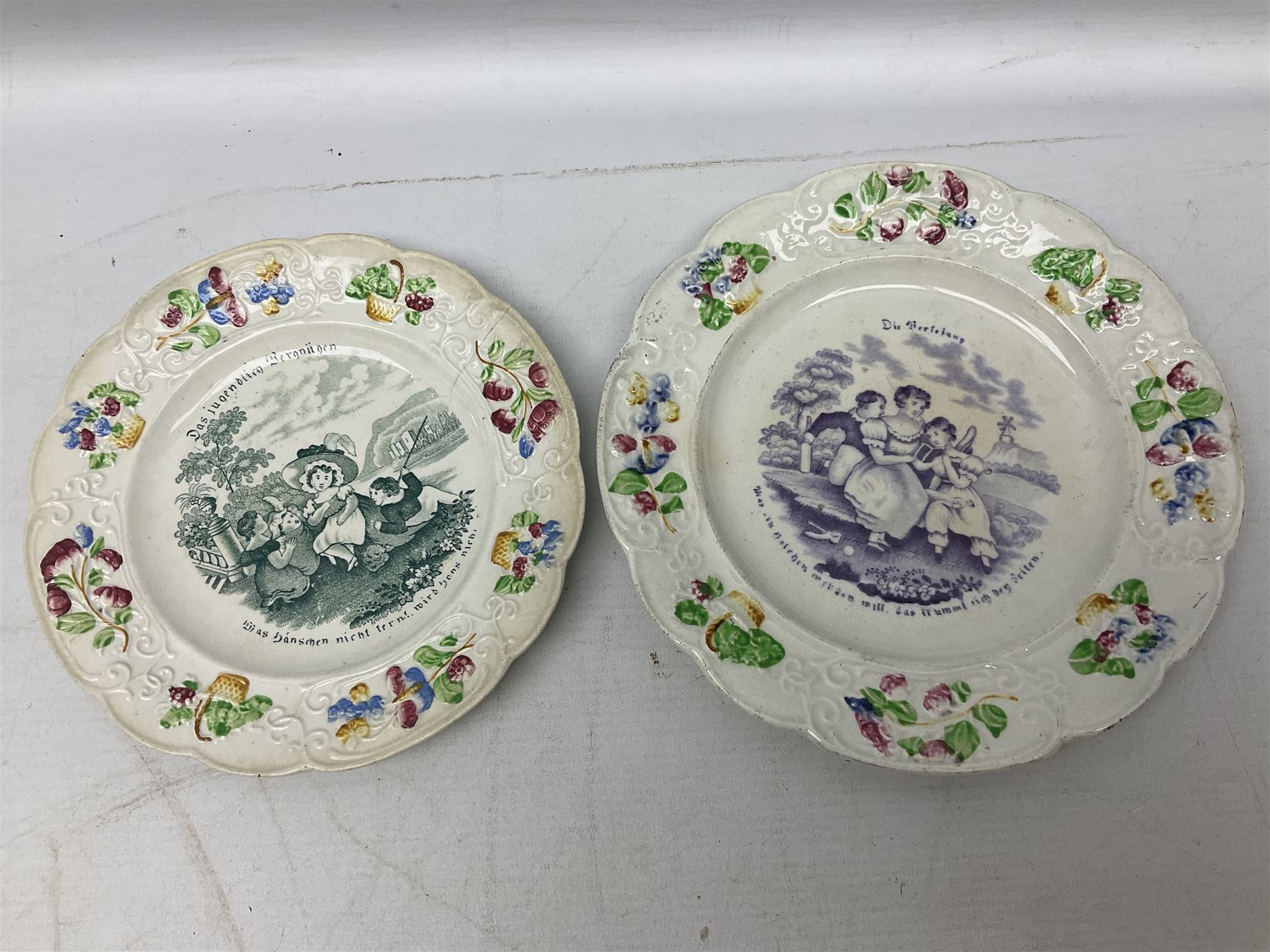 Collection of 19th century William Smith & Co nursery plates, to include examples decorated in the pastime series, and similar, all with moulded floral borders