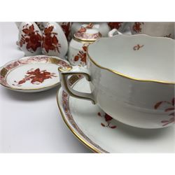 Herend Chinese Bouquet Rose pattern tea service comprising teapot, coffee pot, open sucrier, six cups and saucers, six tea plates, cream jug and stand, milk jug, two teabag holders, preserve pot, two leaf shaped dishes, four egg cups, salt & pepper pots, pair side plates and another plate