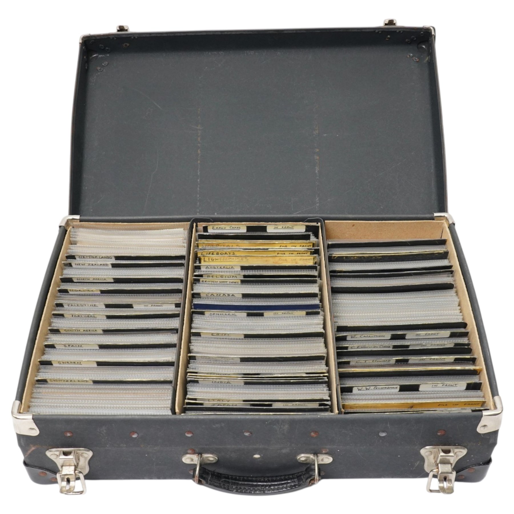 Case containing a large quantity of postcards including foreign topographical sorted by country, art and artists, comic, industrial etc over 1000 cards