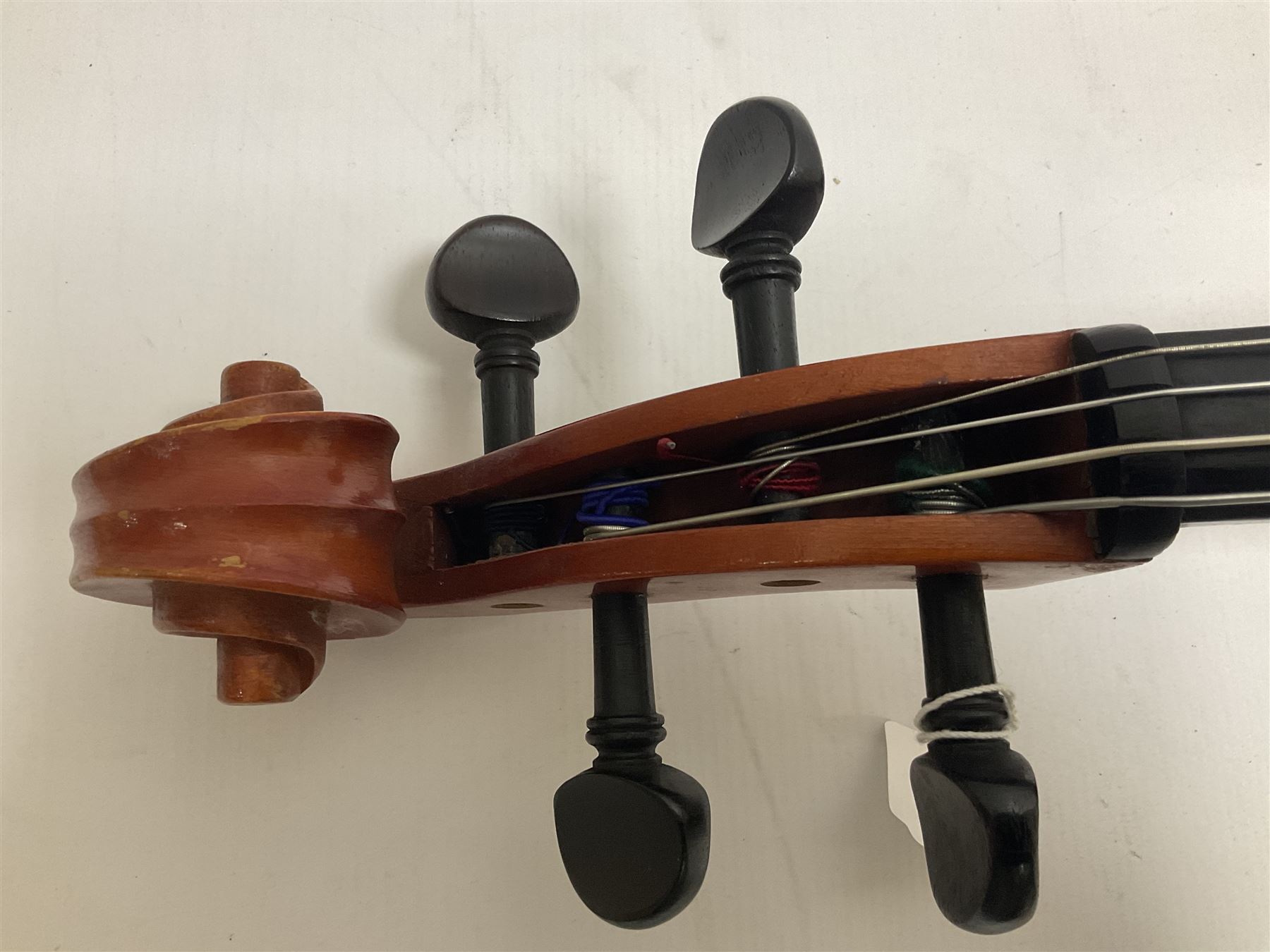 3/4 size cello with soft case, 69cm back length, 114cm full length, with bridge, ebonised tail piece and fingerboard.