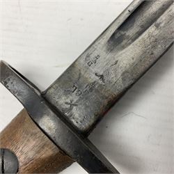 WWI British 1907 pattern bayonet, the 43cm fullered blade by Wilkinson with various marks to the ricasso; in leather covered scabbard numbered 294 to the throat and stamped M/58 L58.5cm overall