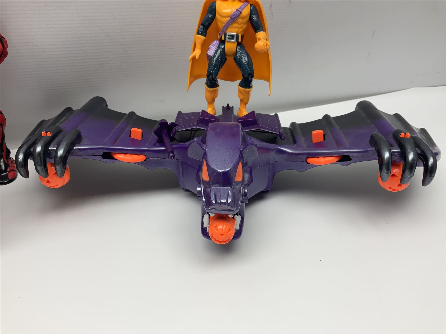 Group of early 90s Marvel/DC Comics toys; 1993 Kenner Batmobile with original Batman figure and plane; Marvel Comics Spider-Man 1994 Web of Steel series Hobgoblin Wing Bomber, incomplete Daily Bugle Playset and Scorpion; assorted figurines and later accessories 