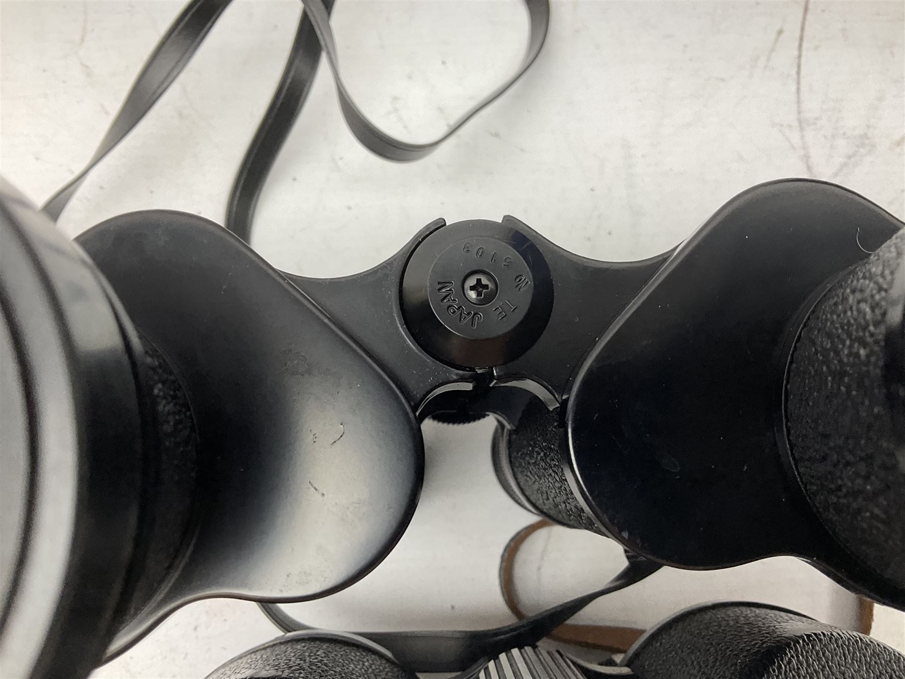 Twelve pairs of binoculars to include BWCF 7x35 Extra Wide Angle, Carl Zeiss Jena Delturis 8x24, Carl Zeiss Jena Jenoptem 8x30W, Chinon Countryman 10x50,  Ajax 8x30, Regent 16x50, etc,  some with cases